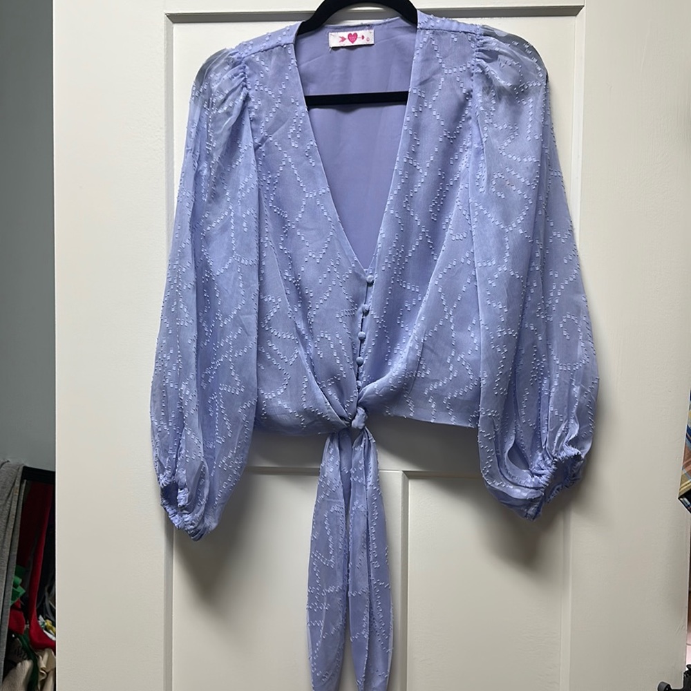 Buddy Love size large - light purple color size runs small shear sleeve